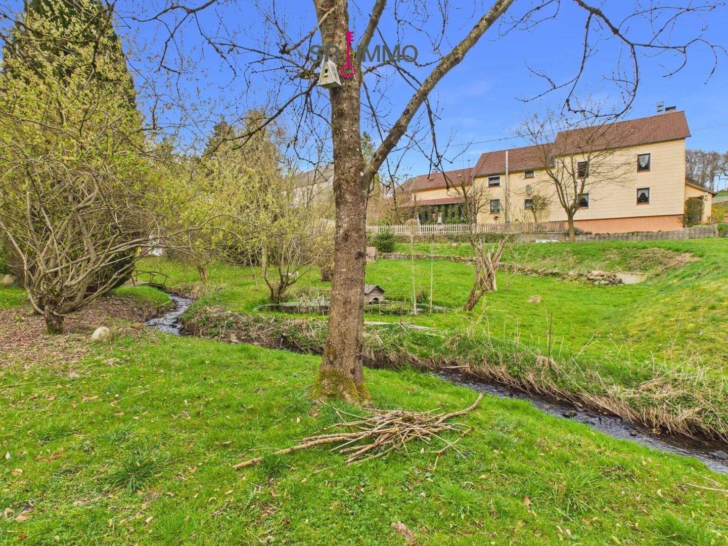 Immobilie in Heilbach - Liebevoll gepflegtes Einfamilienhaus mit idyllischem Garten und romantischem Bachlauf - Bild 0