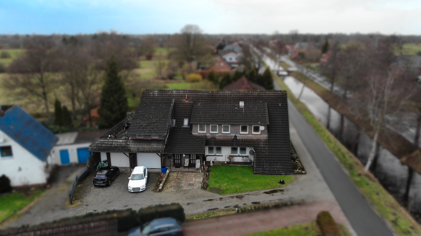 Immobilie in Moormerland - Kapitalanleger aufgepasst! Vermietetes Mehrfamilienhaus mit 3 Wohneinheiten in Wiekenlage - Bild 1