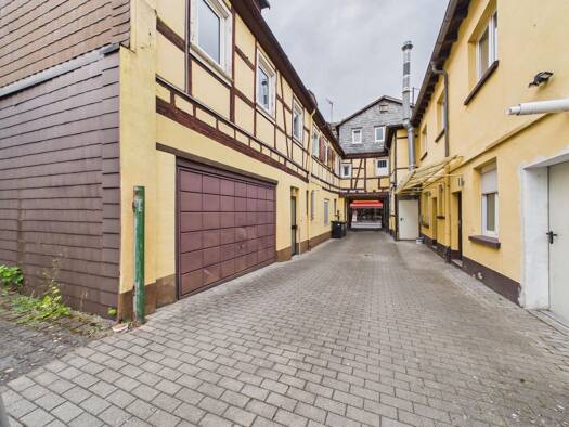 Mehrfamilienhaus zum Kauf 729.000 € 8,5 Zimmer 289 m² 165 m² Grundstück Fechenheim Frankfurt am Main 60386