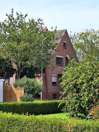 Einfamilienhaus zum Kauf 160.000 € 8 Zimmer 118,8 m² 883 m² Grundstück Accum Schortens 26419