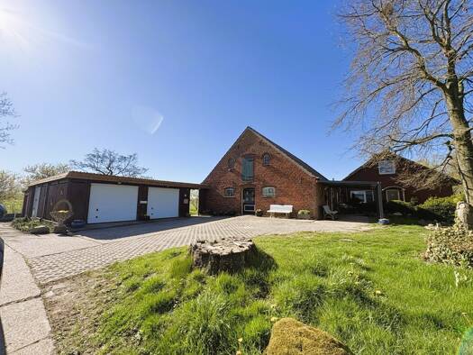 Einfamilienhaus zum Kauf 336.000 € 7 Zimmer 213 m² 2.377 m² Grundstück Waddenserdeich Butjadingen 26969