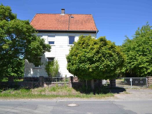 Mehrfamilienhaus zum Kauf 148.000 € 7 Zimmer 190 m² 2.800 m² Grundstück Klusfeld 5 Wangelnstedt Wangelnstedt 37627