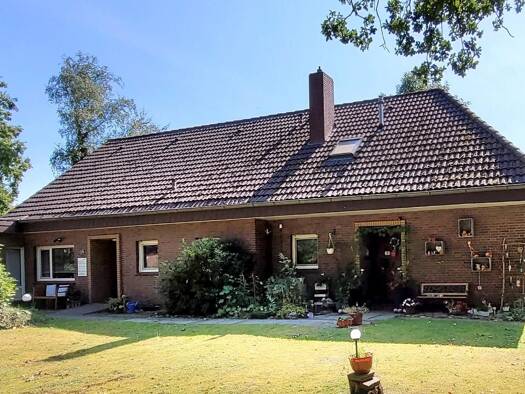 Mehrfamilienhaus zum Kauf 365.000 € 9 Zimmer 216 m² 5.642 m² Grundstück Schweinebrück Zetel 26340