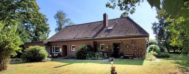 Mehrfamilienhaus zum Kauf 365.000 € 9 Zimmer 216 m² 5.642 m² Grundstück Schweinebrück Zetel 26340