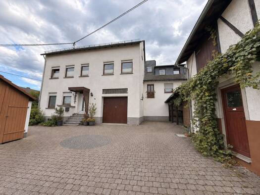 Mehrfamilienhaus zum Kauf 450.000 € 257 m² 1.006 m² Grundstück Brey Brey 56321