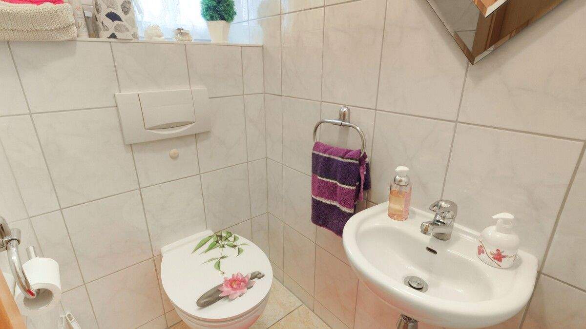 Immobilie in Brinkum - Gepflegtes Einfamilienhaus mit traumhaftem Garten - Bild 2