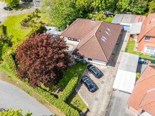Einfamilienhaus zum Kauf 369.000 € 5 Zimmer 225 m² 1.069 m² Grundstück Haxtum Aurich 26605