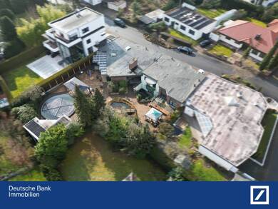 Bungalow zum Kauf 1.490.000 € 9 Zimmer 264 m² 1.100 m² Grundstück Langen 6 Langen 63225