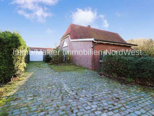 Einfamilienhaus zum Kauf 249.000 € 5 Zimmer 211,6 m² 4.024 m² Grundstück Baumstraße 6 Blersum Wittmund 26409