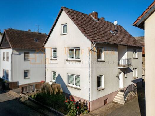 Haus zum Kauf 249.000 € 6 Zimmer 145 m² 635 m² Grundstück frei ab sofort Burgsolms Solms 35606