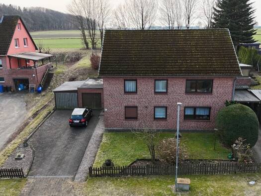 Mehrfamilienhaus zum Kauf 399.000 € 6 Zimmer 147 m² 1.000 m² Grundstück Treppenberg 8 Iddensen Rosengarten 21224