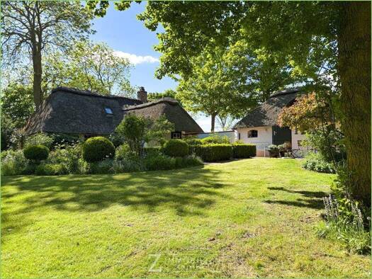 Einfamilienhaus zum Kauf 665.000 € 5 Zimmer 88 m² 1.429 m² Grundstück Tetenbüll / Wasserkoog 25882