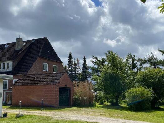 Einfamilienhaus zum Kauf 129.000 € 10,5 Zimmer 245 m² 6.351 m² Grundstück Weesby 24994
