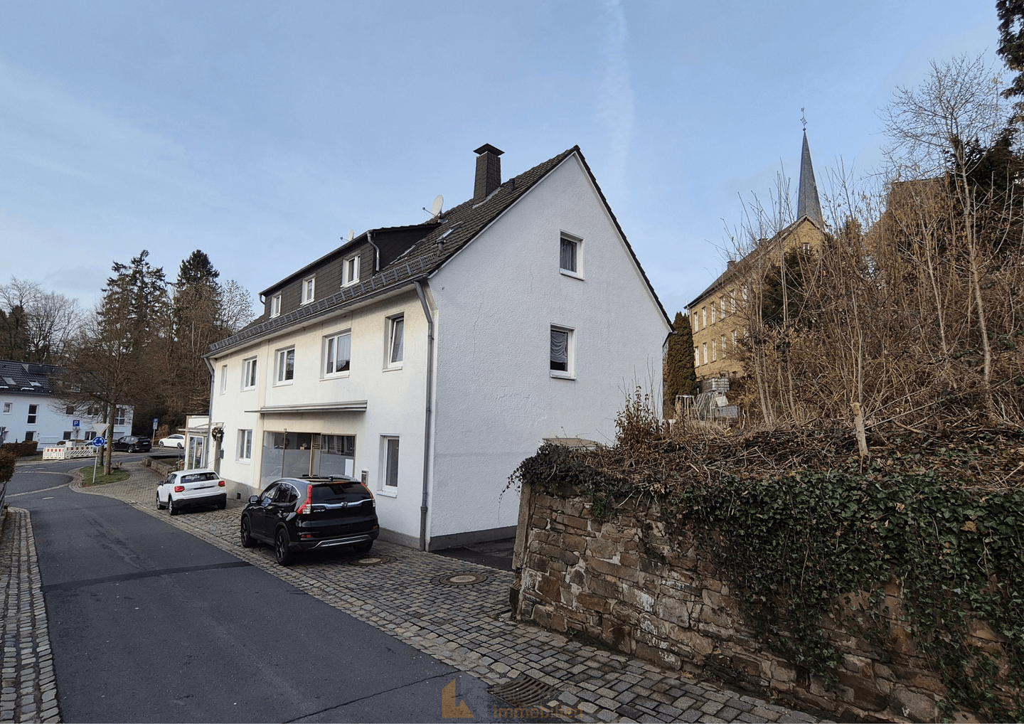 Immobilie in Ruppichteroth - Wohn-/ Geschäftshaus mit Potenzial in zentraler Lage von Ruppichteroth - Bild 2