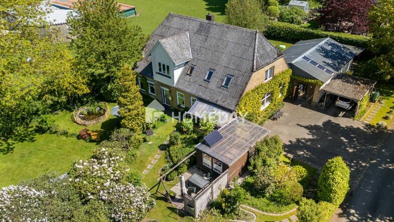 Mehrfamilienhaus zum Kauf 240.000 € 9 Zimmer 229 m² 1.835 m² Grundstück Wittbek 25872