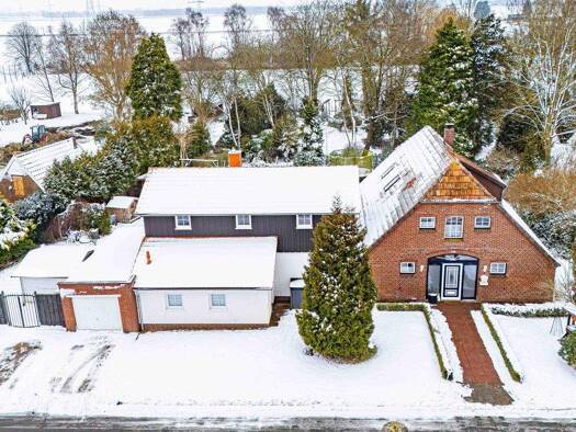 Einfamilienhaus zum Kauf 299.000 € 8 Zimmer 220 m² 2.670 m² Grundstück Schwei Stadland 26936