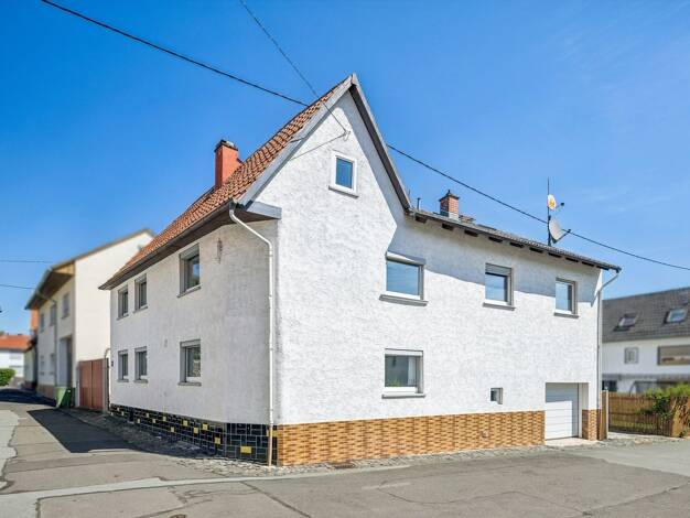 Einfamilienhaus zum Kauf 245.000 € 7 Zimmer 142 m² 257 m² Grundstück Holzheim Pohlheim 35415