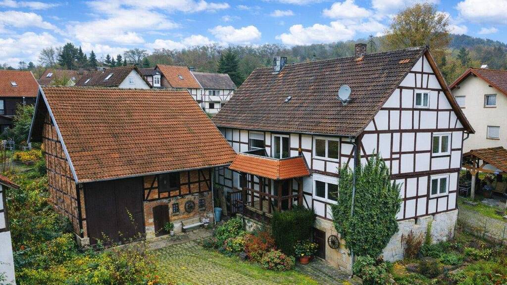 Einfamilienhaus zum Kauf 199.000 € 13 Zimmer 200 m² 1.300 m² Grundstück Guntershausen Baunatal / Guntershausen 34225
