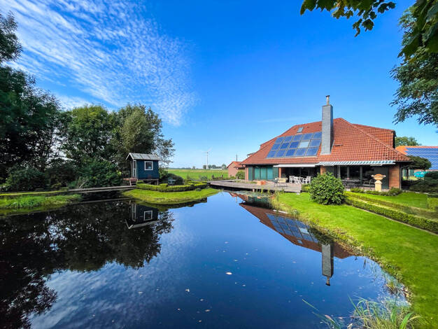 Einfamilienhaus zum Kauf 649.000 € 5 Zimmer 202 m² 2.399 m² Grundstück Burhafe Wittmund 26409