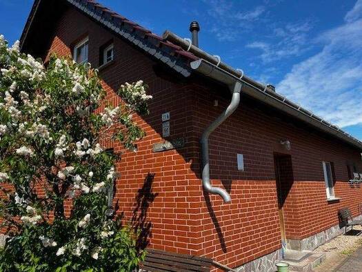 Einfamilienhaus zum Kauf 395.000 € 3,5 Zimmer 89 m² 998 m² Grundstück Rauen 15518