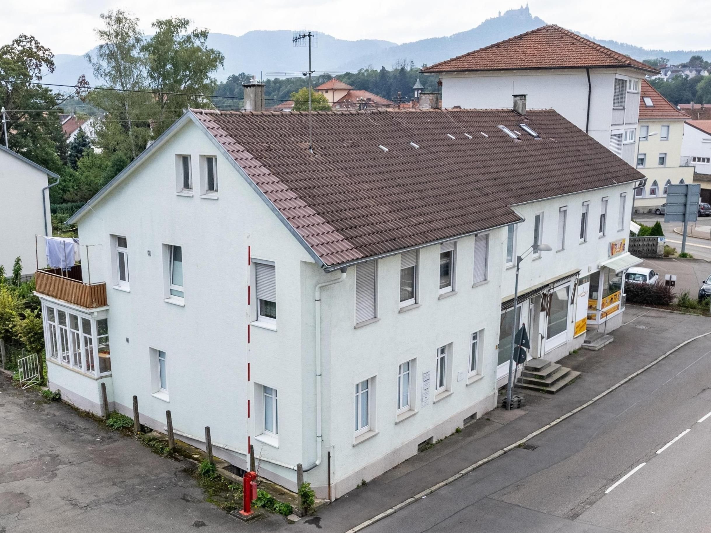 Wohn- und Geschäftshaus zum Kauf als Kapitalanlage geeignet 490.000 € 428 m²<br/>Fläche 775 m²<br/>Grundstück Hechingen Hechingen 72379