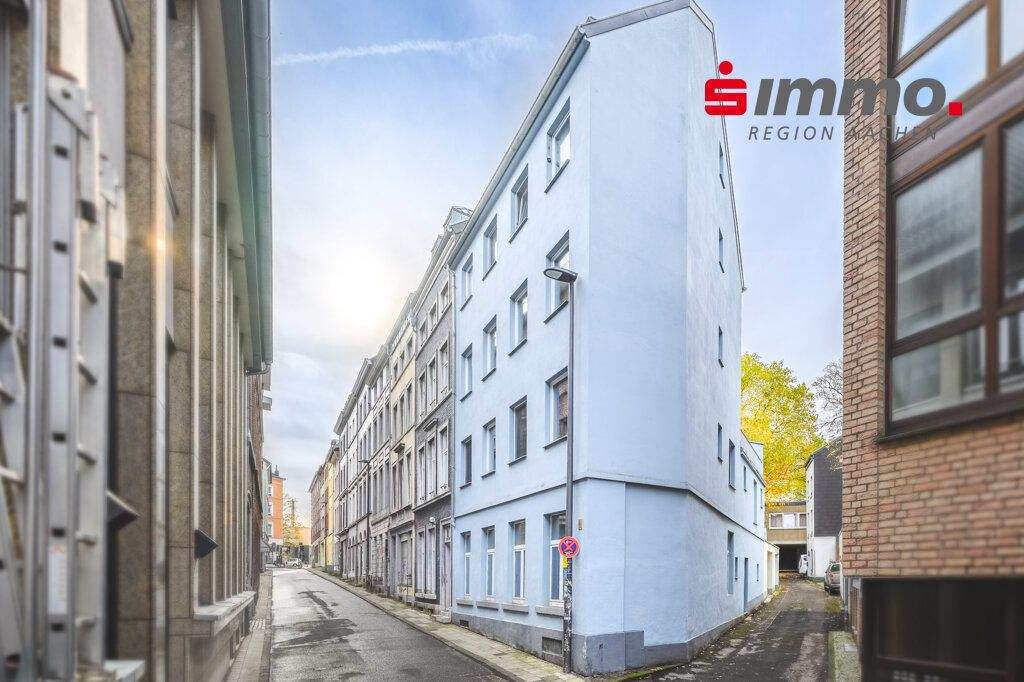 Grundlegend modernisiertes Mehrfamilienhaus in zentraler Lage