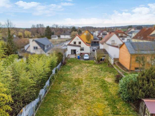 Einfamilienhaus zum Kauf 329.000 € 5 Zimmer 110,2 m² 870 m² Grundstück Münzenberg 35516