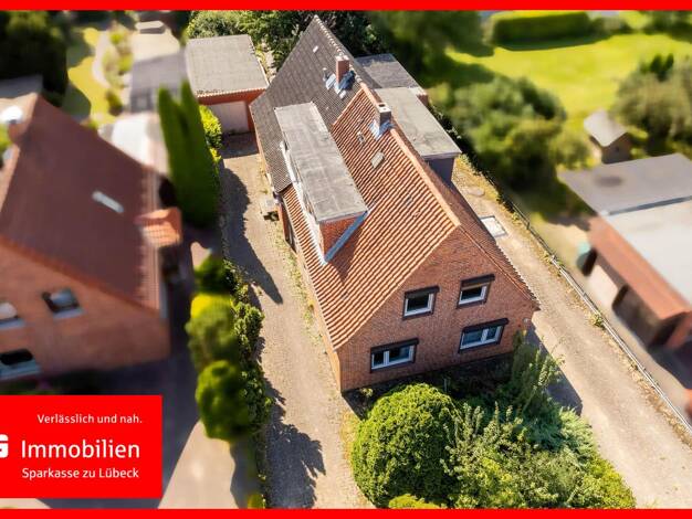 Mehrfamilienhaus zum Kauf 329.000 € 8 Zimmer 170 m² 1.313 m² Grundstück Stockelsdorf 23617