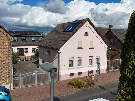 Einfamilienhaus zum Kauf 310.000 € 6 Zimmer 110 m² 207 m² Grundstück Burg-Gräfenrode Karben 61184