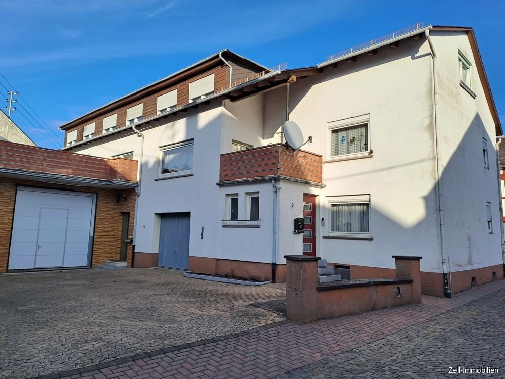 Mehrfamilienhaus zum Kauf 350.000 € 10 Zimmer 324 m²<br/>Wohnfläche 404 m²<br/>Grundstück Weisel Weisel 56348