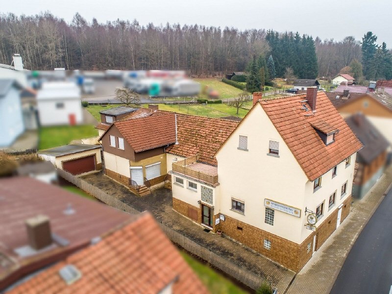 Mehrfamilienhaus zum Kauf 289.000 € 17 Zimmer 206 m²<br/>Wohnfläche 1.081 m²<br/>Grundstück Steinberg Gedern 63688