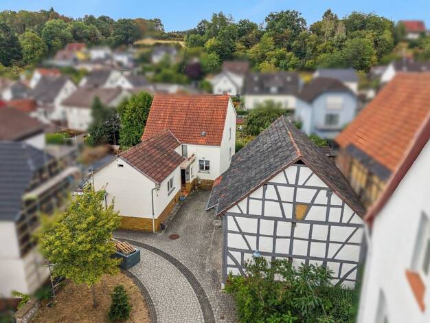 Einfamilienhaus zum Kauf 249.000 € 5 Zimmer 132 m² 639 m² Grundstück Frankenbach Biebertal 35444