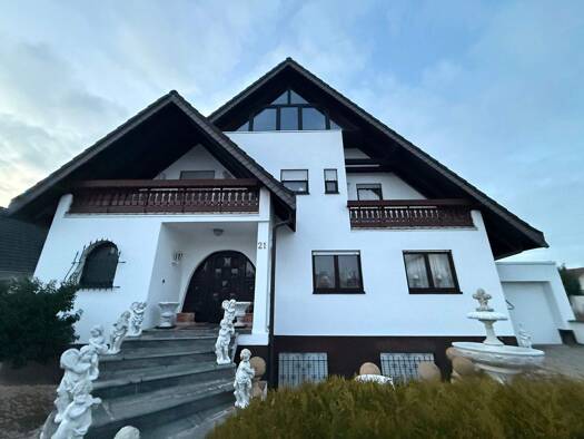 Einfamilienhaus zum Kauf 470.000 € 8 Zimmer 228 m² 573 m² Grundstück Altlußheim 68804