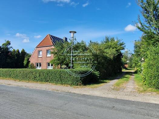 Einfamilienhaus zum Kauf 349.000 € 6 Zimmer 115 m² 1.846 m² Grundstück Tossens Butjadingen 26969