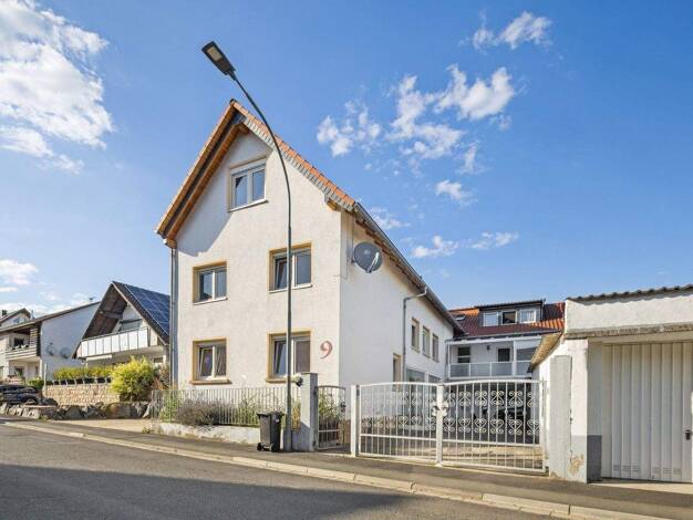 Einfamilienhaus zum Kauf 320.000 € 9 Zimmer 224 m² 290 m² Grundstück Nieder-Weisel Butzbach 35510
