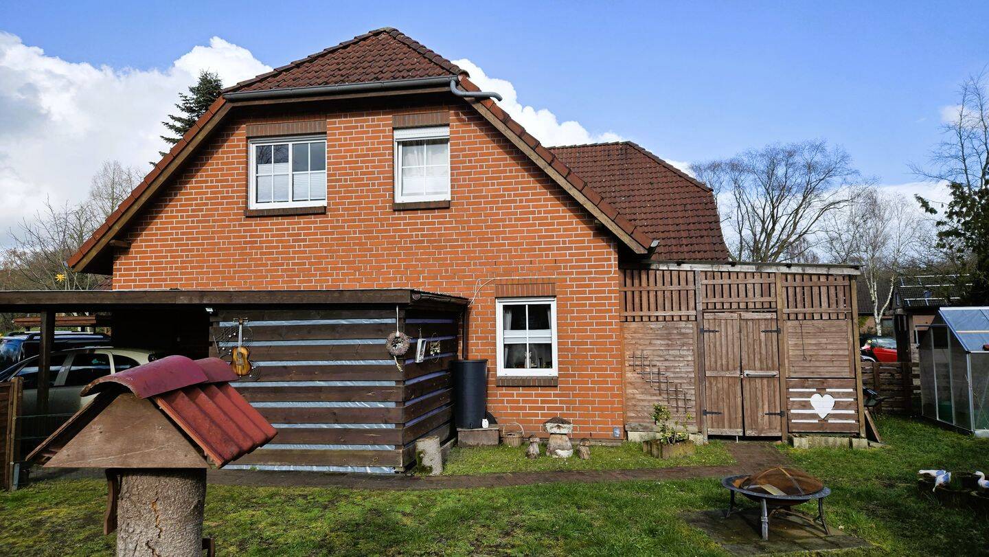 Immobilie in Uplengen - Attraktives Mehrfamilienhaus mit drei Wohneinheiten in zentraler Lage von Remels! - Bild 4