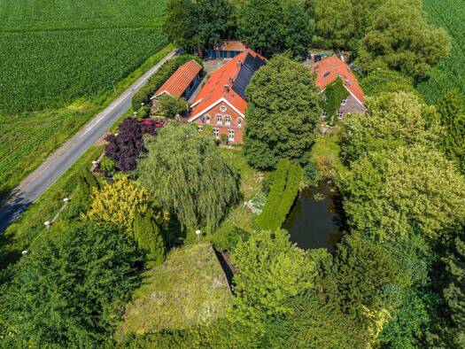 Einfamilienhaus zum Kauf 890.000 € 12 Zimmer 323 m² 5.017 m² Grundstück Großsander Uplengen 26670