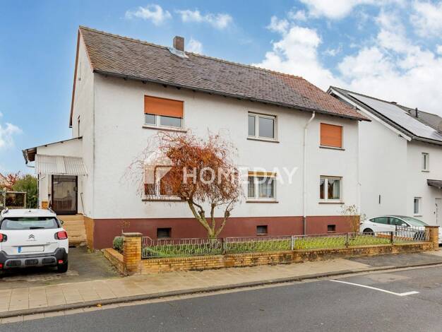 Einfamilienhaus zum Kauf 399.000 € 7 Zimmer 165 m² 657 m² Grundstück Weckesheim Reichelsheim 61203