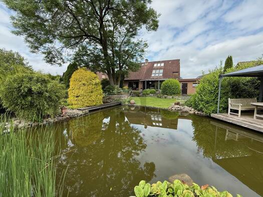 Einfamilienhaus zum Kauf 440.000 € 5 Zimmer 170 m² 1.473 m² Grundstück Ottenbüttel 25591