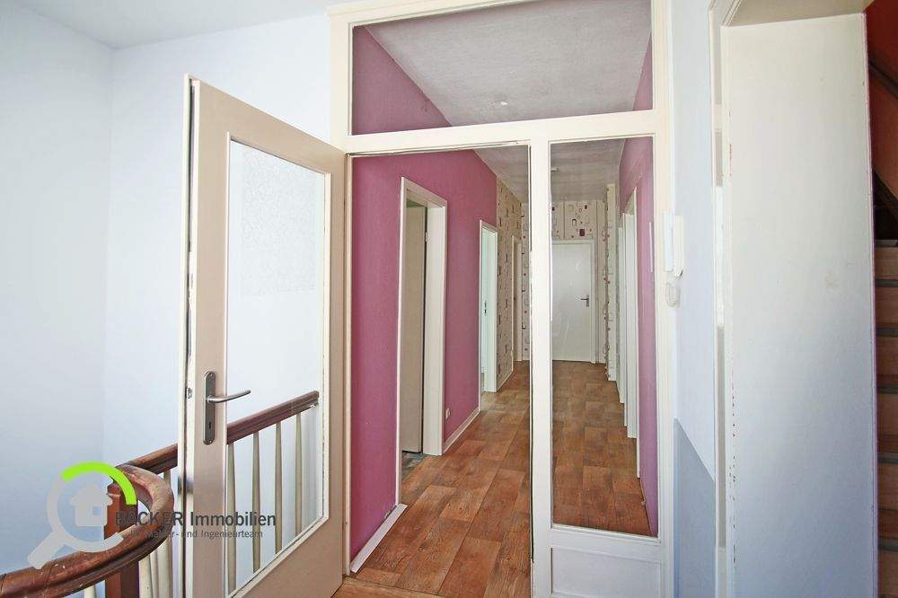 Immobilie in Lemförde - Vielseitiges Wohn- und Geschäftshaus mit Garten und Garage in zentraler Lage von Lemförde - Bild 3