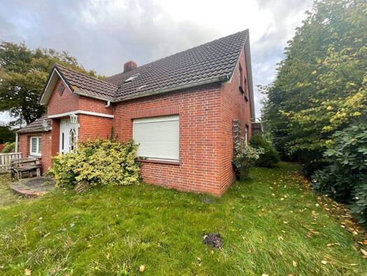 Einfamilienhaus zum Kauf 199.000 € 5 Zimmer 130 m² 1.404 m² Grundstück Wiesens Aurich 26605