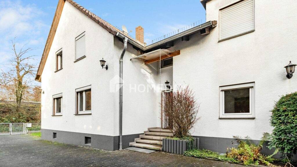 Mehrfamilienhaus zum Kauf 399.000 € 8 Zimmer 175 m² 1.500 m² Grundstück Griesheim Frankfurt 65933