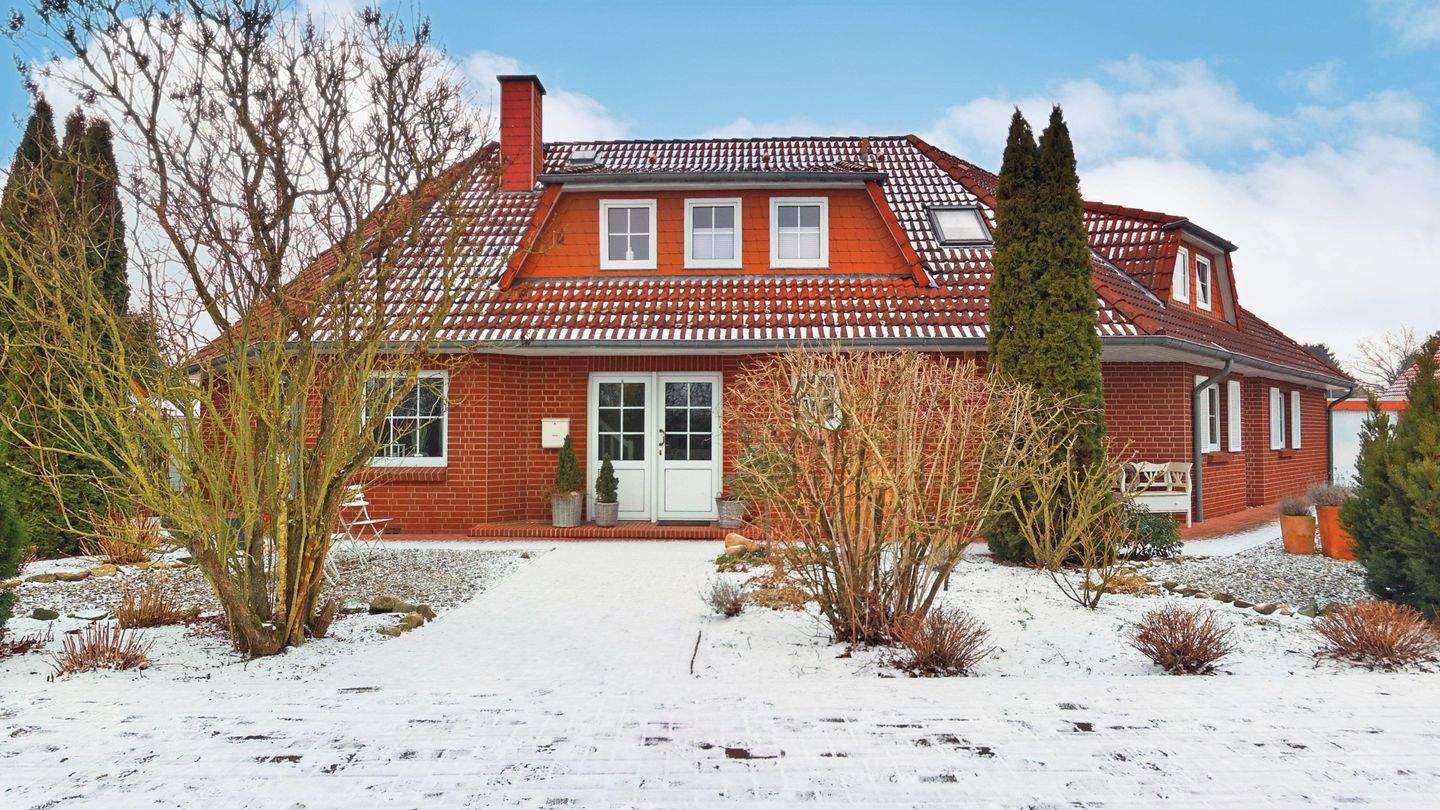 Immobilie in Landesbergen - Doppelhaushälfte mit großzügigem Wohngefühl und liebevoll angelegtem Garten - Bild 0