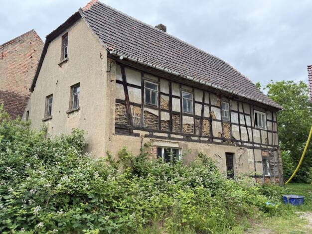 Einfamilienhaus zum Kauf 89.900 € 160 m² 1.069 m² Grundstück Großdalzig Zwenkau 04442