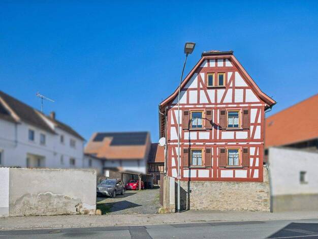 Einfamilienhaus zum Kauf 298.000 € 5 Zimmer 136 m² 1.142 m² Grundstück Kirch-Göns Butzbach 35510