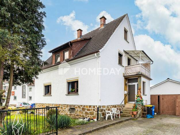 Einfamilienhaus zum Kauf 275.000 € 4 Zimmer 150 m² 618 m² Grundstück Schwalbach Schöffengrund 35641