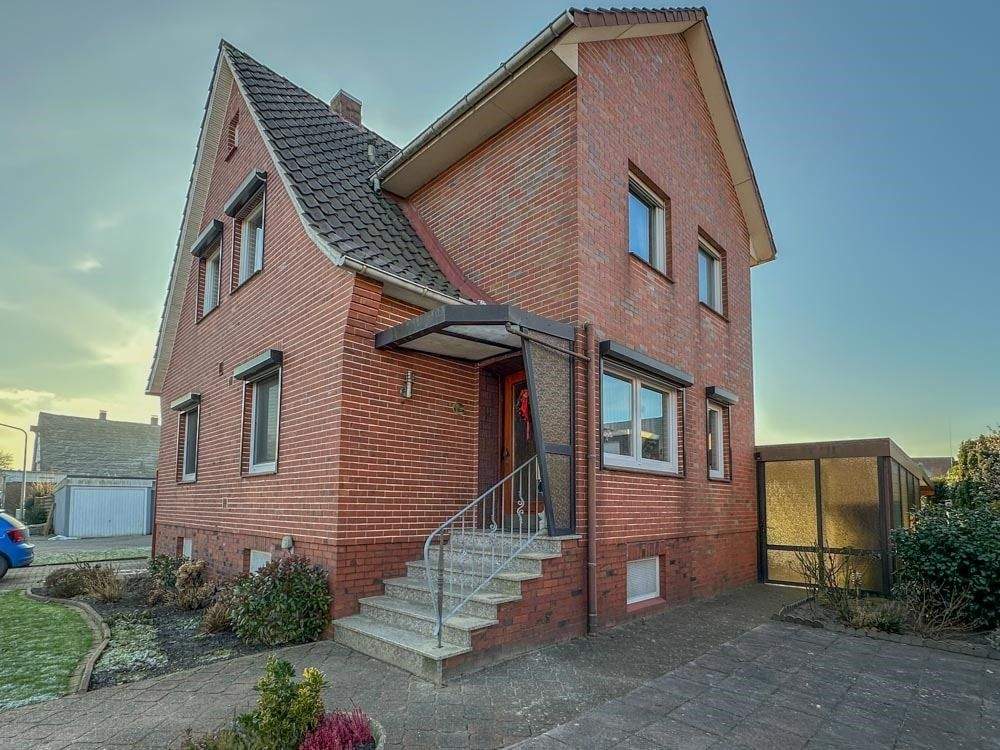 Immobilie in Drochtersen - Solides Einfamilienhaus mit Garage in Drochtersen - Bild 0