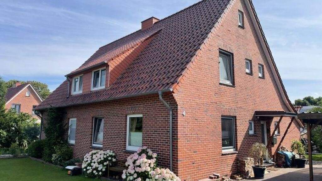 Mehrfamilienhaus zum Kauf 299.000 € 9 Zimmer 180 m² 1.256 m² Grundstück Ruhwarden Butjadingen 26969