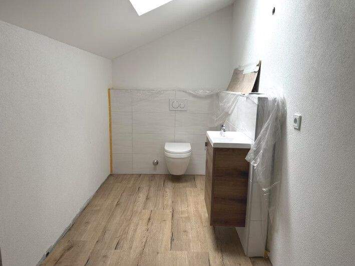 Immobilie in Schillingen - Kernsanierte Dachgeschosswohnung in Schillingen - Bild 1