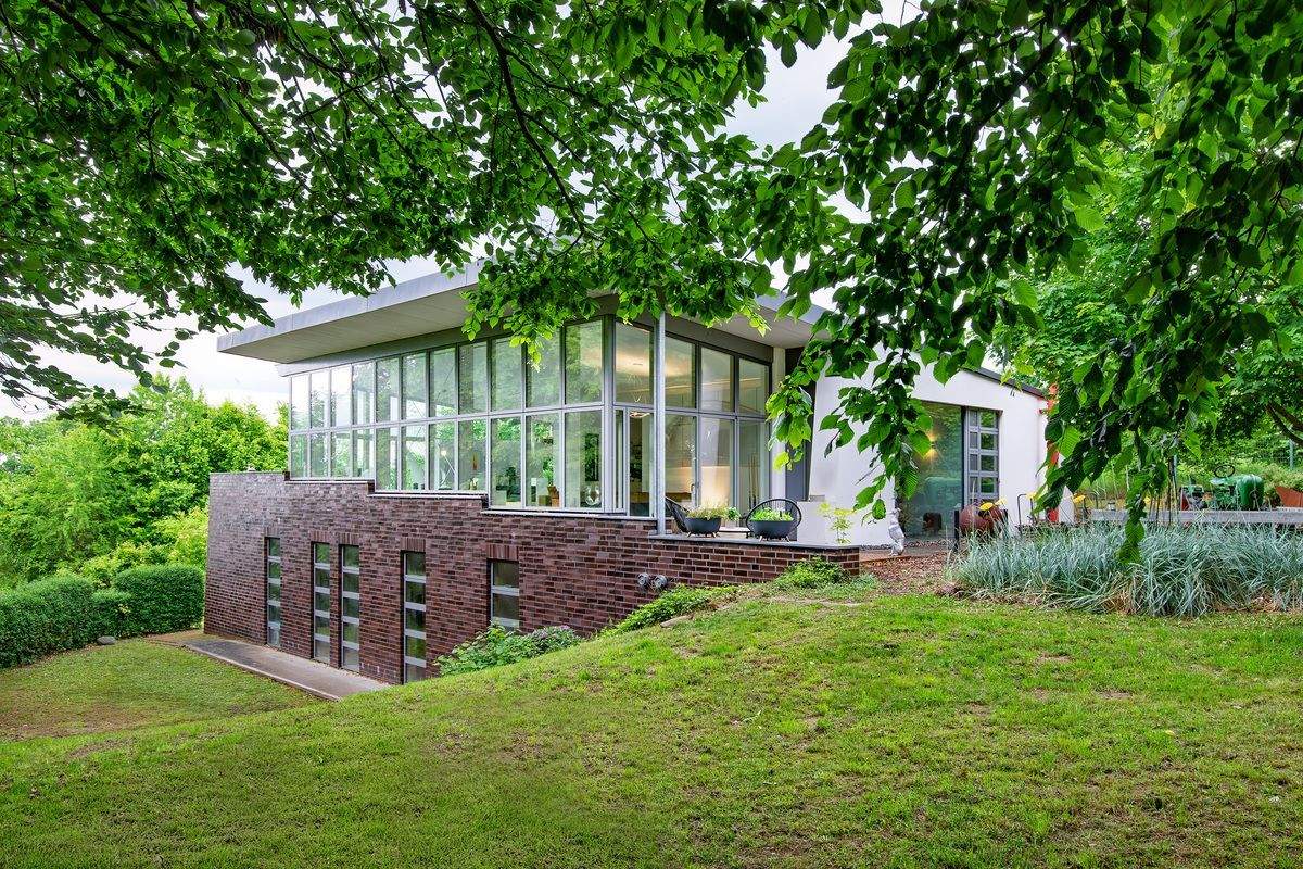 Immobilie in Nehmten - Hoch über dem Plöner See in Naturlage - Architektur trifft Aussicht! - Bild 2